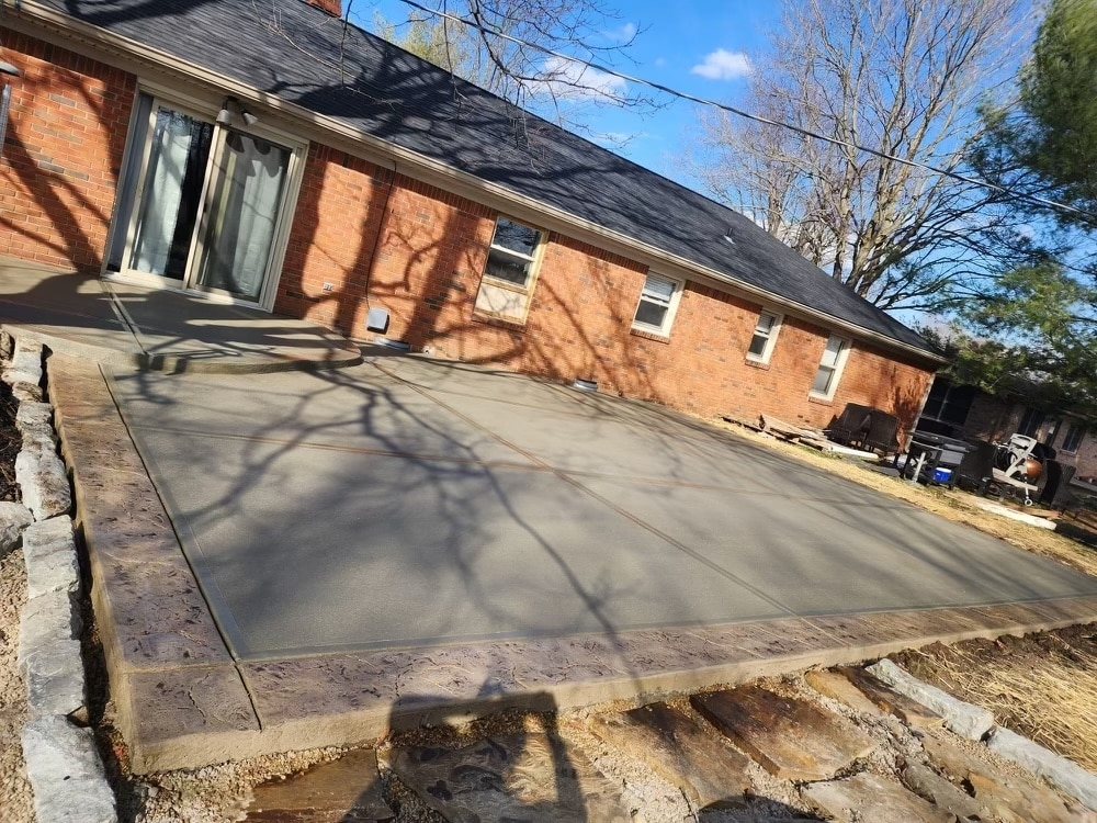 Concrete patio with stamped concrete edge