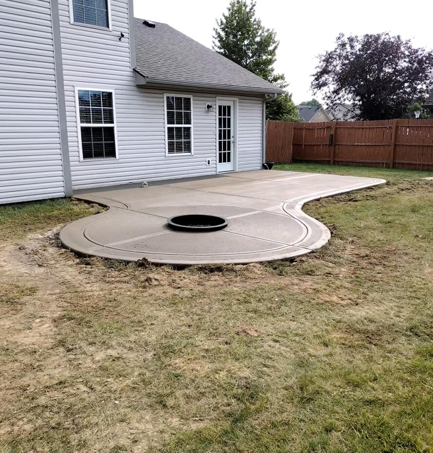 Concrete Patio Contractor - concrete patio with fireplace pit
